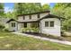Side view showcasing the home's architecture, landscaping, and inviting walkway at 814 Ellynn Dr, Cary, NC 27511