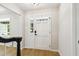 Hallway featuring hardwood flooring and a view of the home's architecture at 814 Ellynn Dr, Cary, NC 27511
