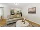 Comfortable living room with hardwood floors open to kitchen, great for entertaining and Gathering gatherings at 814 Ellynn Dr, Cary, NC 27511
