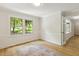 Office area with hardwood floors, wainscoting, and french doors, creating a bright and professional workspace at 814 Ellynn Dr, Cary, NC 27511