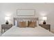 Comfortable main bedroom featuring an upholstered headboard at 8504 Boot Ct, Raleigh, NC 27615