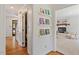 Charming hallway with hardwood floors and access to the living room at 8504 Boot Ct, Raleigh, NC 27615