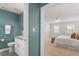 Bedroom features neutral paint, carpet floors, and natural light from several windows at 8504 Boot Ct, Raleigh, NC 27615