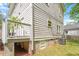 Exterior view of a home with a backyard, deck and air conditioner at 905 Carroll St, Durham, NC 27701