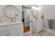 Shared bathroom featuring granite countertops and dual sinks at 905 Carroll St, Durham, NC 27701