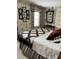 Bedroom featuring classic decor and patterned wallpaper at 9301 Brookton Ct, Raleigh, NC 27615