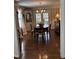 Elegant dining room with hardwood floors, chandelier, and classic furniture for sophisticated meals at 9301 Brookton Ct, Raleigh, NC 27615