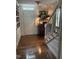 Elegant entryway with hardwood floors, a classic staircase, and refined decor creating a welcoming ambiance at 9301 Brookton Ct, Raleigh, NC 27615