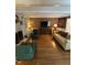 Inviting living room with fireplace, built-in shelving, and hardwood floors at 9301 Brookton Ct, Raleigh, NC 27615