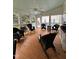 Inviting sunroom filled with comfortable wicker furniture at 9301 Brookton Ct, Raleigh, NC 27615