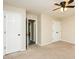 Bedroom with two doors and a ceiling fan at 942 S Fifth St, Mebane, NC 27302