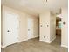 Open living room featuring hardwood floors and neutral paint, adjacent to kitchen at 942 S Fifth St, Mebane, NC 27302