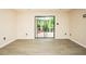 Bright living space with sliding glass doors leading to outdoor deck and backyard at 942 S Fifth St, Mebane, NC 27302
