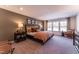 Spacious bedroom showcasing natural light, neutral decor, and coordinated furnishings for a calming atmosphere at Lot 8 Cooper St, Sanford, NC 27330