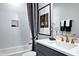 Elegant bathroom featuring a sleek vanity, modern fixtures, and stylish decor at 1 Deer Run Trl, Hillsborough, NC 27278