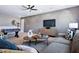 Cozy living room featuring modern decor, stylish furniture, and a decorative accent wall at 1 Deer Run Trl, Hillsborough, NC 27278