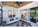 Cozy covered patio with sliding glass doors opening up into the living room and kitchen at 1 Deer Run Trl, Hillsborough, NC 27278