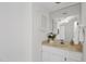 Bathroom featuring vanity with sink and a large mirror at 101 Creekview Cir, Carrboro, NC 27510
