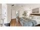 Bedroom featuring wood floors, vaulted ceiling, fan, and ensuite bath and closet at 101 Creekview Cir, Carrboro, NC 27510
