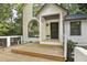 Welcoming front entrance featuring a covered porch and stylish details at 101 Creekview Cir, Carrboro, NC 27510