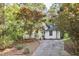 Charming home with a well-maintained yard and a beautiful stone retaining wall at 101 Creekview Cir, Carrboro, NC 27510