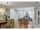 Open-concept living area with hardwood floors and a bright, inviting atmosphere at 101 Creekview Cir, Carrboro, NC 27510