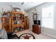 Spare bedroom with a desk, shelving, and unique decor at 1013 Chelsea Run Ln, Apex, NC 27502
