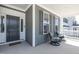 Inviting front porch with seating offering a relaxing outdoor space at 1013 Chelsea Run Ln, Apex, NC 27502