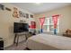 Comfortable bedroom features a large window with decorative curtains and a spacious layout at 11 Grifton Pl, Durham, NC 27704