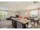 Open floor plan combining kitchen, dining, and living area for modern living at 11 Grifton Pl, Durham, NC 27704