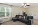 Comfortable living space with large window, sofa, and cozy decor at 11 Grifton Pl, Durham, NC 27704