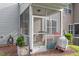 Screened in porch with furniture at 11 Grifton Pl, Durham, NC 27704