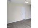 Light-filled bedroom featuring fresh paint, a ceiling fan, and updated flooring at 111 Shadow Bend Ln, Selma, NC 27576