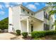 Charming exterior view of home featuring neutral siding, covered entry and landscaped yard at 1121 Silky Dogwood Trl, Apex, NC 27502