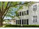 Charming two-story home with neutral siding, dark shutters, and lush landscaping in a friendly neighborhood at 1121 Silky Dogwood Trl, Apex, NC 27502