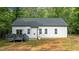 Back of home with deck at 118 Chanute Cir, Louisburg, NC 27549
