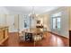 Dining room with a round table, chandelier, and natural light at 118 Duncansby Ct, Cary, NC 27511