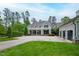 Stately two-story home with black shutters, columns, and a large front lawn at 118 Duncansby Ct, Cary, NC 27511