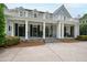 Two-story home featuring a balcony and a large covered porch at 118 Duncansby Ct, Cary, NC 27511