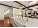Spacious kitchen with marble countertops, custom cabinetry, and a large farmhouse sink at 118 Duncansby Ct, Cary, NC 27511