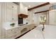 Elegant kitchen with large island with cooktop and sink adjacent at 118 Duncansby Ct, Cary, NC 27511