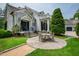 Charming patio with outdoor seating, stone pavers, and views of the manicured yard at 118 Duncansby Ct, Cary, NC 27511