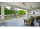 Relaxing covered porch with views of the pond and surrounding neighborhood at 118 Duncansby Ct, Cary, NC 27511