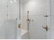 Modern shower features a glass door and classic gold fixtures at 118 Duncansby Ct, Cary, NC 27511