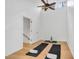 A minimalist living room with high ceilings, wood floors, and neutral décor at 121 Ladybug Ln, Chapel Hill, NC 27516