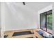 Bright yoga room featuring a sliding glass door to a balcony at 121 Ladybug Ln, Chapel Hill, NC 27516