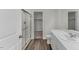 Bathroom featuring a glass-enclosed shower, white vanity, and modern fixtures at 1215 Pond Overlook Drive, Nashville, NC 27856