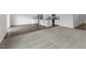 Open-concept living area with hardwood floors and a kitchen island at 1215 Pond Overlook Drive, Nashville, NC 27856