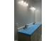 Double vanity in the bathroom with modern fixtures and plenty of storage at 123-125 Ottawa Dr., Louisburg, NC 27549