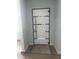 Modern front door featuring sleek design, glass accents, and sturdy construction at 123-125 Ottawa Dr., Louisburg, NC 27549